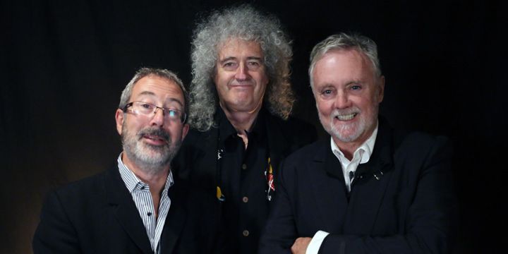 Ben Elton, Brian May y Roger Taylor.